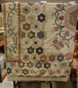 An early 19th Century patchwork quilt,