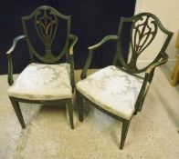 A pair of green painted 19th Century chairs with shield back and lyre shaped splats,