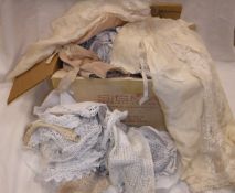 A box of assorted linens, undergarments etc.