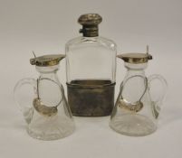 A pair of conical glass Whisky tots with silver mounts (Birmingham 1919) with two silver Whisky
