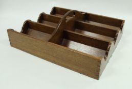 A mahogany six section wine bottle tray in the Georgian manner,