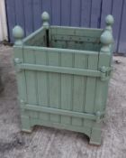 A pair of Versailles green painted and wrought iron bound jardinieres,