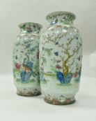 A pair of 19th Century Chinese famille verte and polychrome decorated vases,