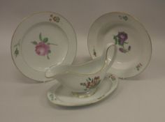 A Meissen floral spray decorated dinner service with gilt rim,