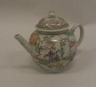 A Chinese Qianlong polychrome decorated teapot,