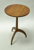 An American cherrywood pedestal occasional table,