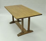 An oak refectory style dining table by Heal's of London,