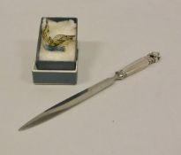 A Georg Jensen silver handled "Acorn" pattern paperknife, bears import marks (London 1963), 15.