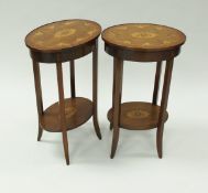 A pair of Edwardian style mahogany inlaid two-tier occasional tables,