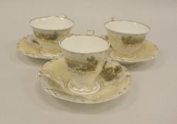 Three 19th Century Copeland and Garrett teacups each decorated with lake landscapes and castles