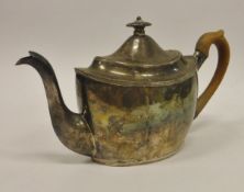 A George III silver teapot of oval form with reeded rim and base,