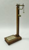 A circa 1900 set of W & T Avery Ltd of Birmingham scales in oak with brass fittings,
