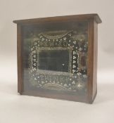 A 19th Century beadwork pincushion with mirrored panels and inscribed "think of me" approx 15 cm