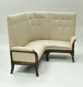 A mahogany framed high back corner sofa in the manner of Louis Majorelle,