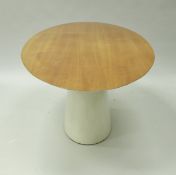 A modern white painted and polished wood oval dining table in the manner of Stephane Le Brun