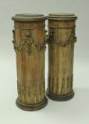 A pair of early 19th Century French kingwood columns of cylindrical form,