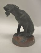 AFTER FOUQUES "Chien de chasse" (5 O'Clock) bronze study of a seated dog on a rosso marble base