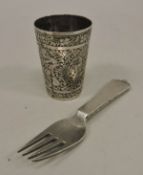 A Georg Jensen silver pyramid pattern miniature fork, bearing import marks for "London 1946", 9.