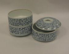 A Japanese porcelain blue and white set of three stacking dishes with cover with all over vine