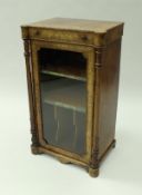 A Victorian walnut and marquetry inlaid music cabinet with quartered and satinwood strung top,