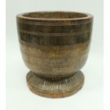 A 19th Century sycamore mortar with stained and ringed decoration to the main body,