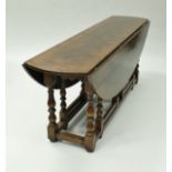 A oak wake table in the 18th Century manner,