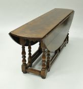 A oak wake table in the 18th Century manner,