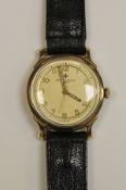 A gentleman's gold wristwatch,