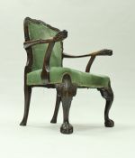 An 18th Century Irish walnut framed elbow chair,