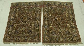 A pair of fine Isphahan rugs,