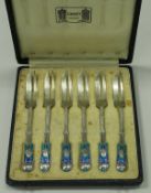 A set of six George V silver and turquoise enamel decorated cake forks in the Art Nouveau taste,