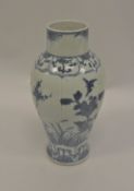 A Chinese Kangxi baluster vase of stylised squash form,