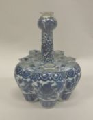 A late 19th Century Chinese blue and white tulip vase of typical form,