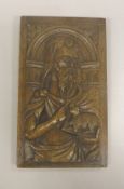 A 19th Century carved oak panel depicting a Saint, John The Baptist, with lamb and book in his arms,