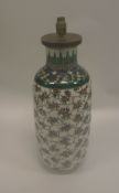 A Chinese polychrome decorated vase with cracked ice and floral design,