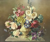 HAROLD CLAYTON (1896-1979) "Relief work jug of flowers on a stone pedestal", a still life study,