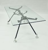A glass and metal framed Nomos dining table designed by Sir Norman Foster for Tecno circa 1980-89,