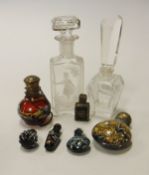 A collection of five Continental coloured glass scent bottles and a small scent bottle with