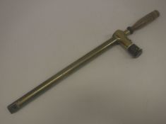 A wooden handled brass trench periscope by R & J Beck Ltd mark "IX 1918 No.