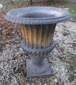 A pair of cast iron garden urns of campana form in the Victorian style, 72 cm high x 58.