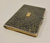 A 19th Century Russian silver niello notebook holder with floral decoration,