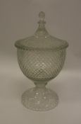 A 19th Century hobnail cut glass punch bowl of urn form raised on a circular foot 36 cm high