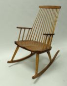 A pair of American cherrywood stick back "New Gloucester" rocking chairs by Thomas Mozer of Maine,