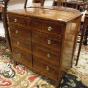A mahogany 2 door cupboard (commode chest conversion) and a mahogany pedestal table