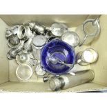 A box containing various small silverwares including two pairs of baluster peppers,