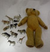 A small gold plush bear and a small quantity of painted lead animals ,