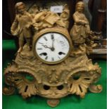 A late 19th Century German walnut cased mantle clock with eight day movement and a 19th Century