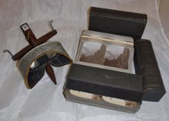 A hand-held stereoscope by Underwood & Underwood,