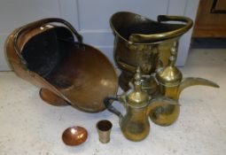 A collection of various metal wares to include copper coal helmet, brass coal helmet,