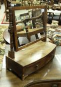 A 19th Century mahonany toilet mirror on two drawer base